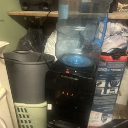 Water Cooler With A Water Bottle