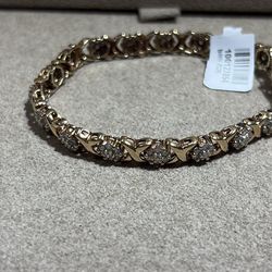 Gold tennis bracelet
