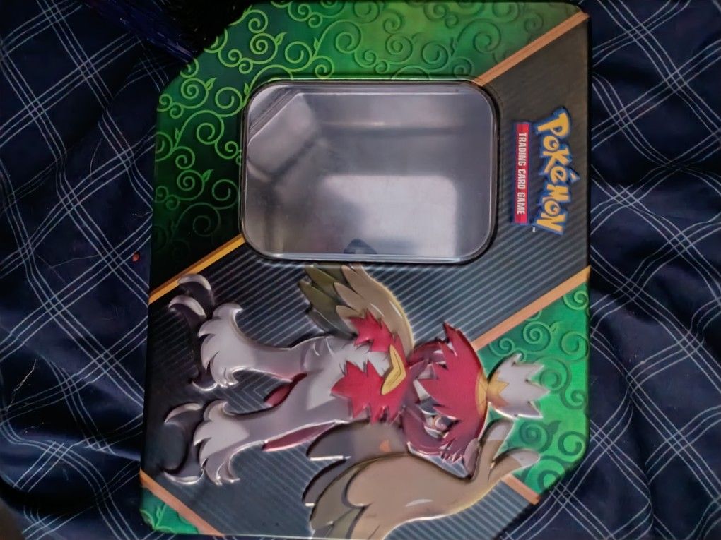 50 Packs Of Halloween edition Pokemon Cards. Original Tin Included