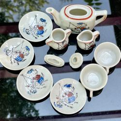 Made in occupied 1940S Porcelain Japan childs tea set with dog fishing