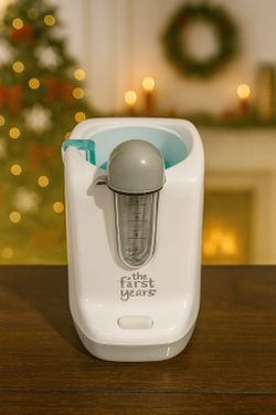The First Years Baby Bottle Warmer – Works Great, Clean 