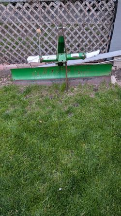 The Frontier RB1072 is a 72-inch (6-foot) standard-duty rear blade designed for Category 1, 3-point hitch tractors, suitable for landscaping, grading,