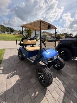 Golf cart and trailer