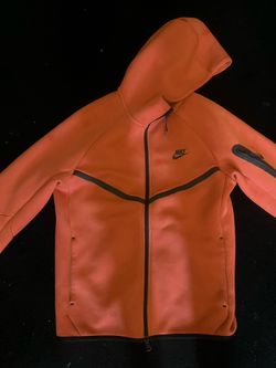 orange Nike Tech