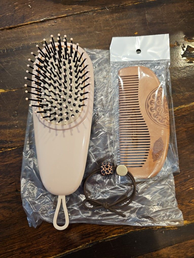 Bran New Set Hair Brush And Comb Comes In A Box.