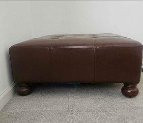 Faux leather ottoman
