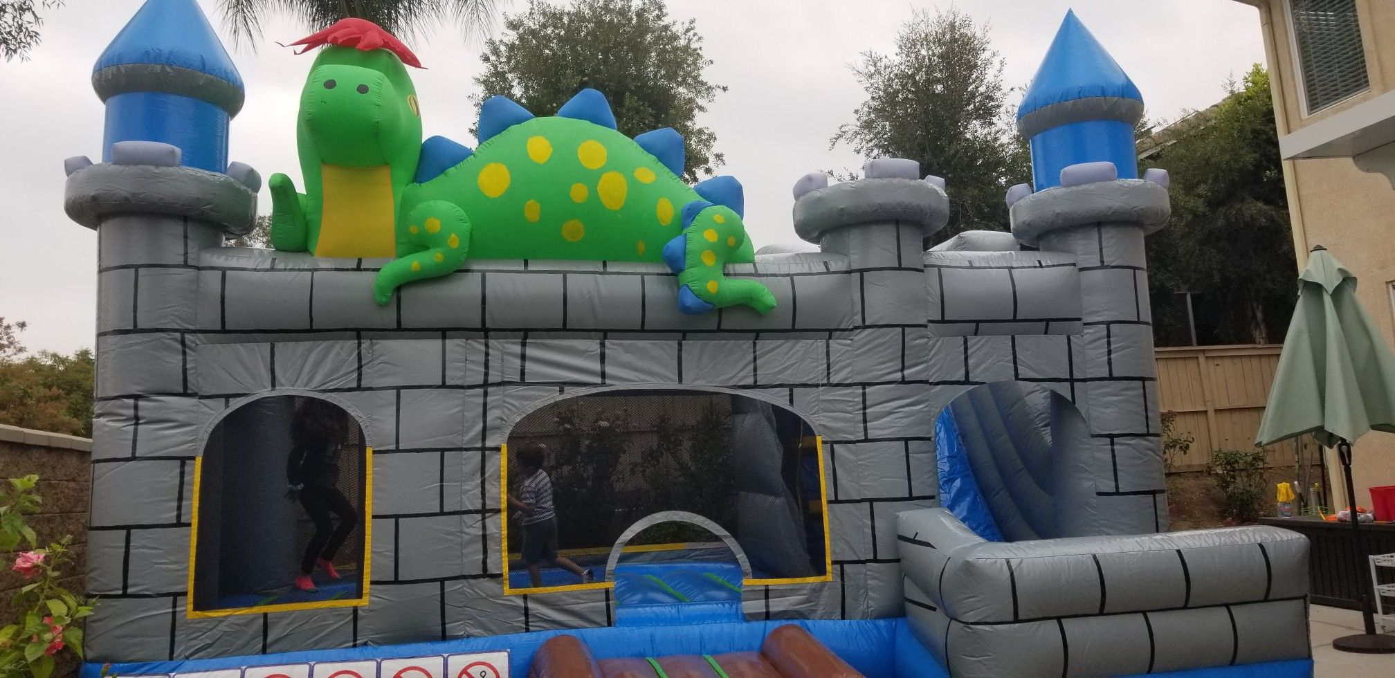 Commercial jumper with slide bounce house