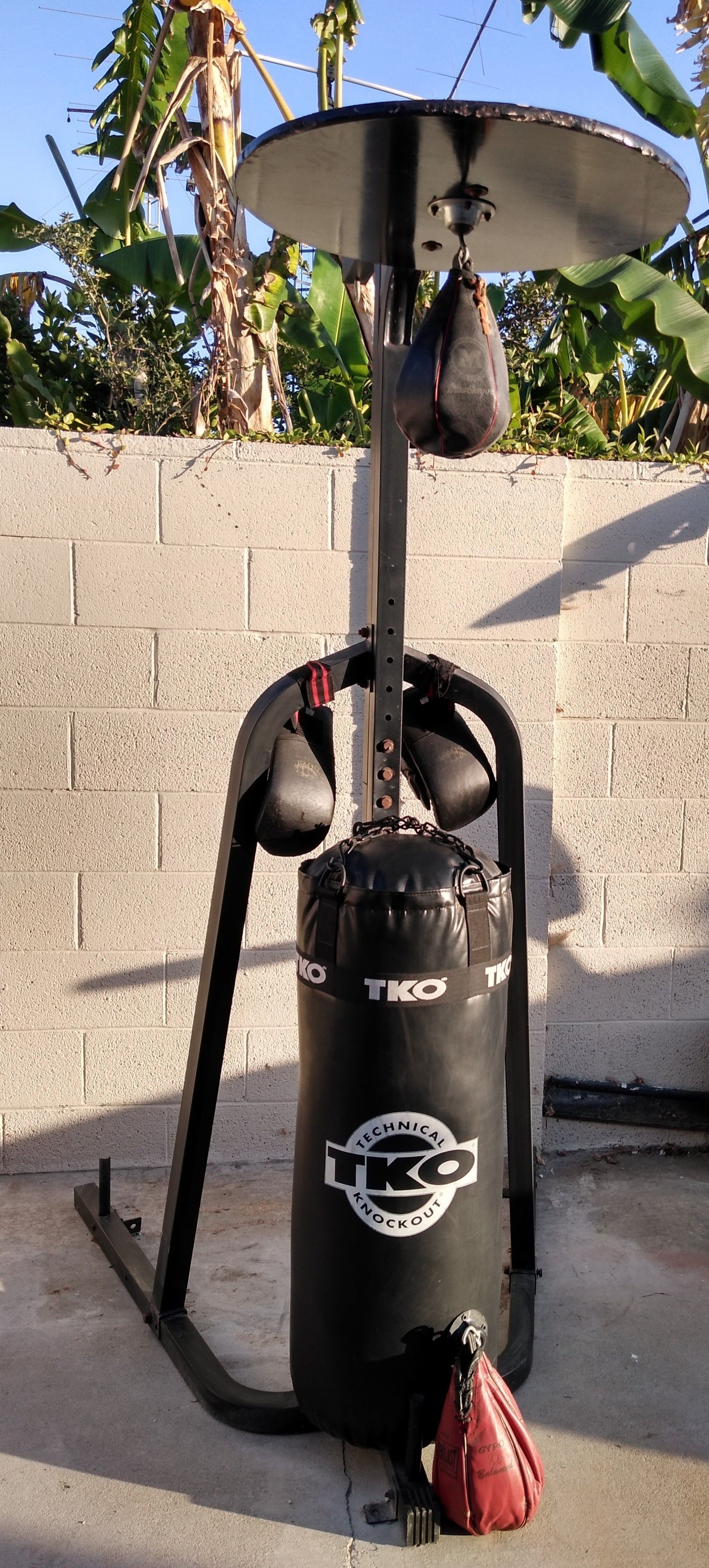 Punching bag stand with speed bag attachment