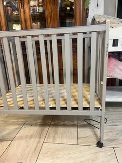 40.     $$$$$$$$.     Mini crib