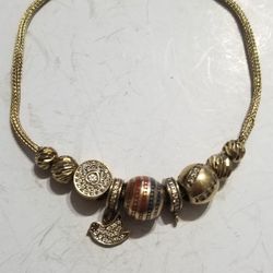 10 karat gold charm bracelet lent 7 and a 1/2 inch