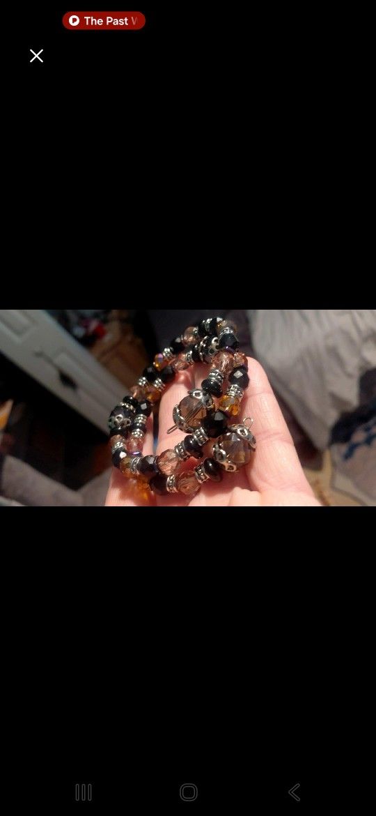 Memory Wire Beaded And Charmed Bracelet 