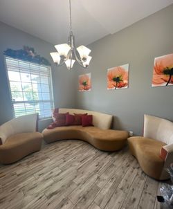Living room couches and 2 swivel chairs