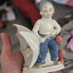 East Germany GDR porcelain figurine WA boy with large umbrella 15 cm