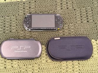 Sony PSP with games.