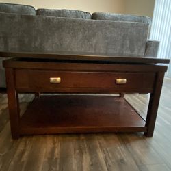 Coffee table with lift top and storage