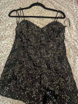 black and gold sequince romper og price $196