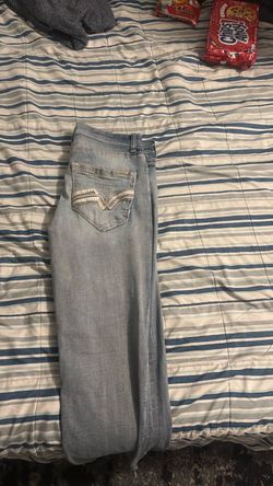Light Wash Denim Jeans with Embroidered Pockets