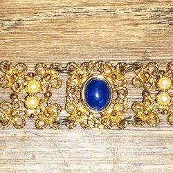 Ornate Vintage-Style Gold-Toned Bracelet with Blue Stones