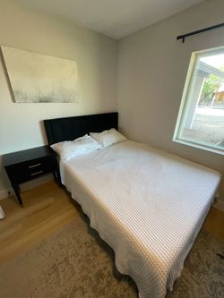 Queen bed w/ mattress, two night stands, and bench