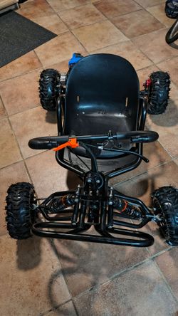 Brand New  Gas-Powered Off-Road Mini Go-Kart (with a 49cc/63cc 2-stroke engine).