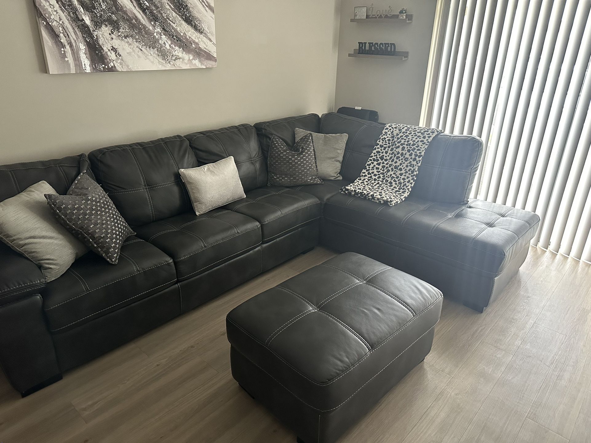 Gray Sectional With Ottoman