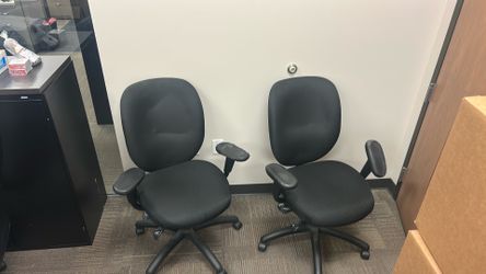 2 used office swivel chairs
