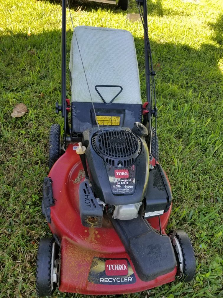 Toro gas self propelled lawn mower.