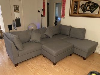Dark grey Smoke free and pet friendly L shaped sofa