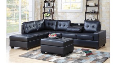 New All black leather sectional with free ottoman