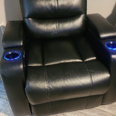 Two Matching Like New Serta Leather Recliners  400 Each