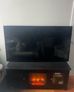 65” 4k TV/fireplace book shelf