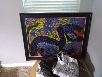 Ony 1 made and it was for me. Mocaic stain glass with real wood frame.