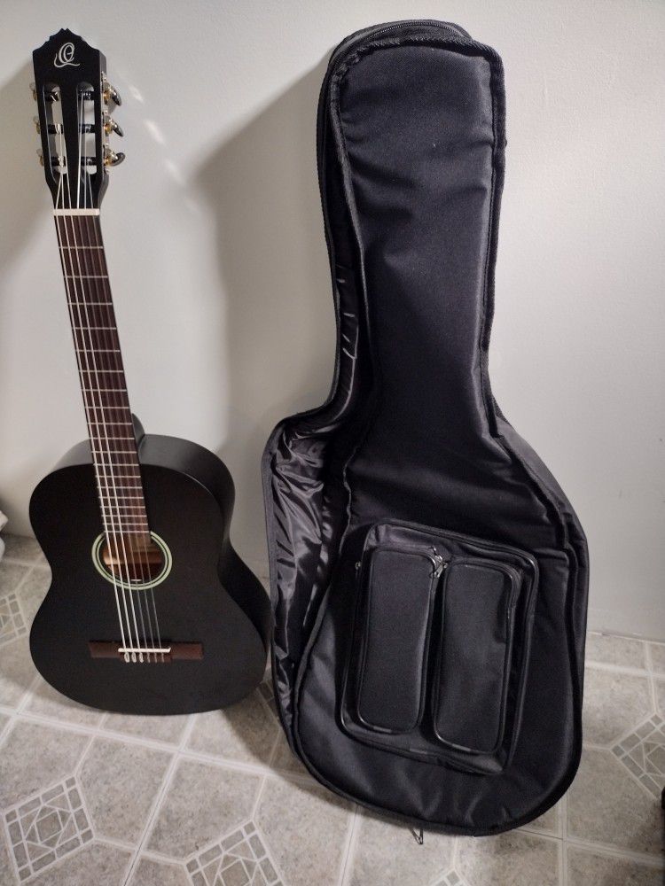 Ortega acoustic guitar and Case 