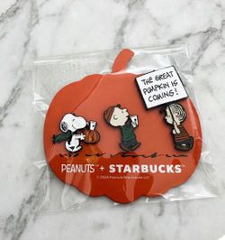 Peanuts x Starbucks Halloween 2026 pumpkin pin set with Snoopy, Charlie Brown, and Woodstock