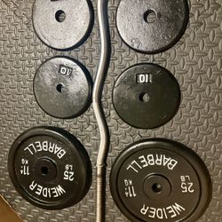Standard Curl Bar with Weight Plates: 25s, 10s, 7.5s and 5 pounders. Brute Weigh: 109#