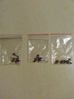 Three separate sets of body piercings check it out