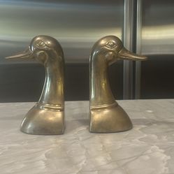 A Pair Of Soiled Brass Duck Head Bookends 