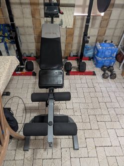Gym bench with leg extension