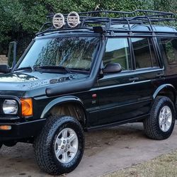 Land Rover Disco2.   4 New Tires And Wheels