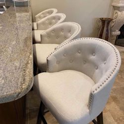 Bar Stools New in Packagings Set of 4 Beautiful Button Tufted and Swivel Retailed For $749.98.