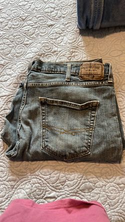 Used men’s faded blue jeans, Levi’s