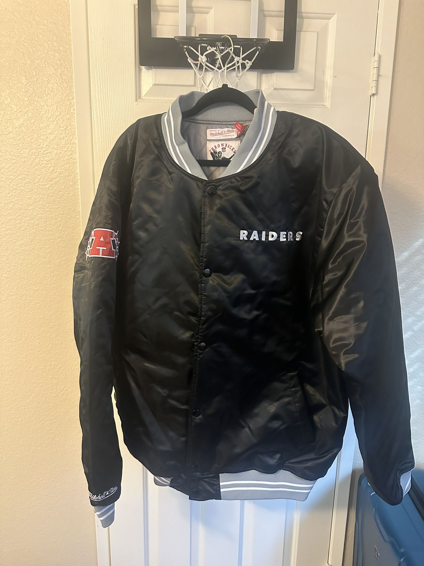 RAIDERS VARSITY JACKET SIZE 2XLT / NEW