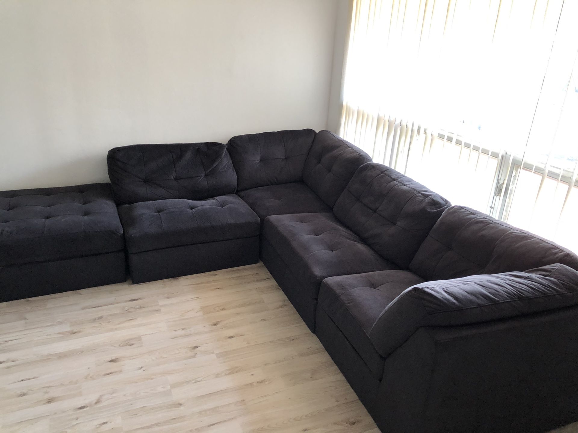 Sectional rearrangeable couch with ottoman