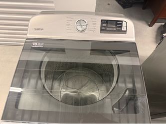 Maytag commercial washer and dryer set.