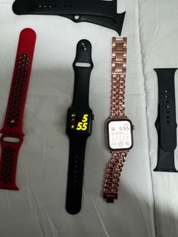 2 Apple Watches W/ extra bands