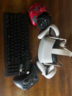 Oculus meta quest 2,keyboard,mouse,and 2 Xbox controllers