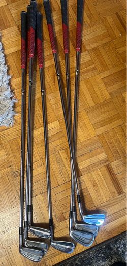Golf Pride golf clubs and golf balls