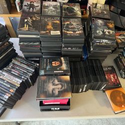 DVDs .. bunch of DVDs ! .. mostlty horror and Halloween movies