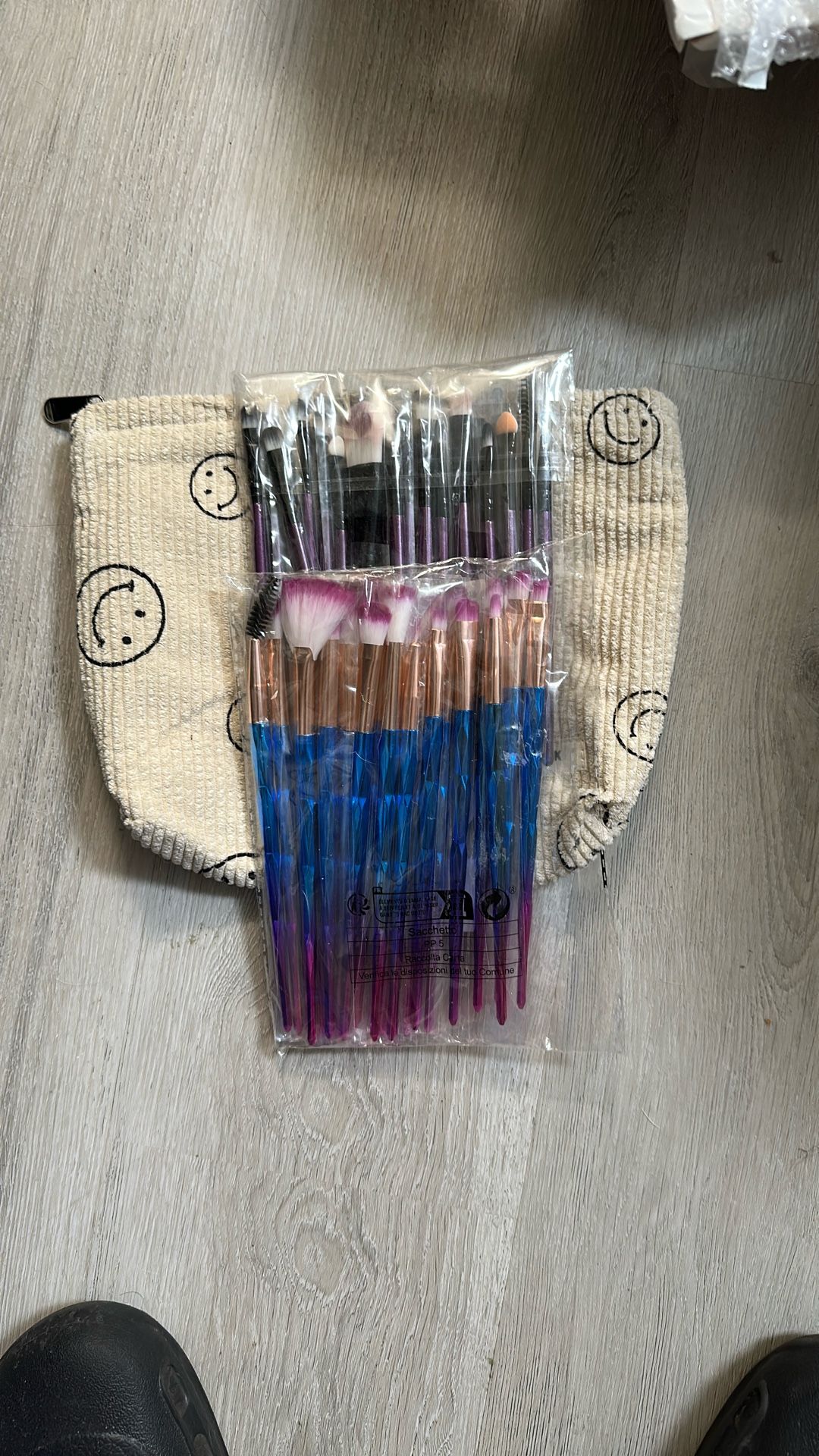2 Different Brush Sets And A Carrying Bag