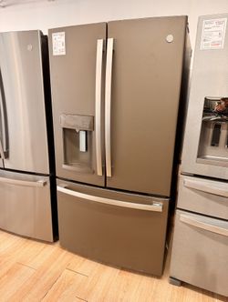 New GE - 27.7 Cu. Ft. French Door Refrigerator with Advanced Water Filtration - Slate Model: GFE28GMKES